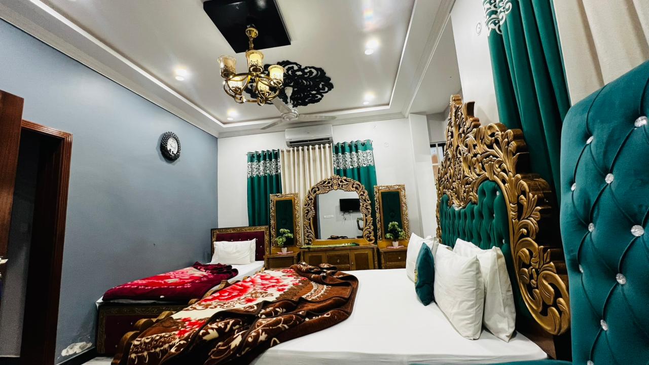 Family Room 6 Persons | 3 Single & 1 Master Bed | Luxury International Guest House G-9/4 | PKR 14,900