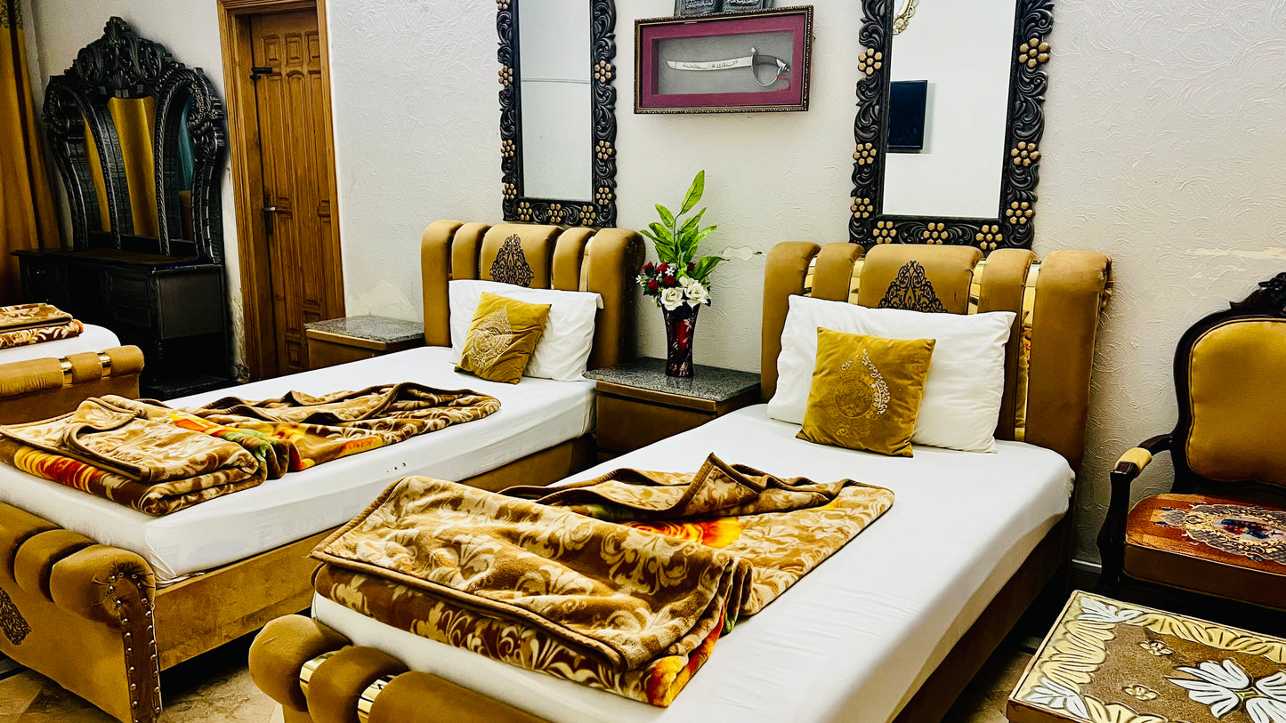 G3 – 4 Single Beds | Galaxy Lodge  Price: PKR 15000 / night Capacity: 4 Guests