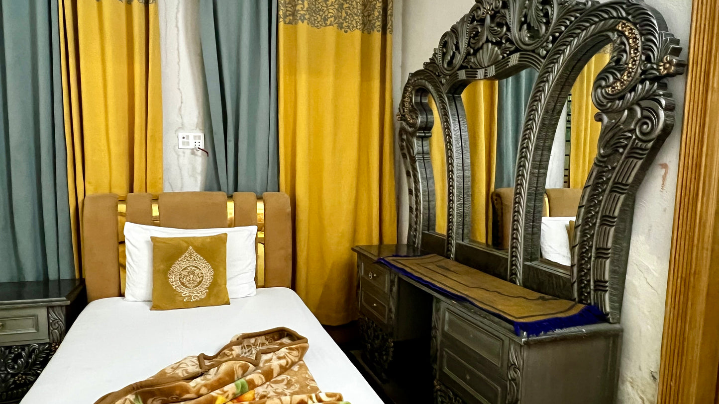 G3 – 4 Single Beds | Galaxy Lodge  Price: PKR 15000 / night Capacity: 4 Guests