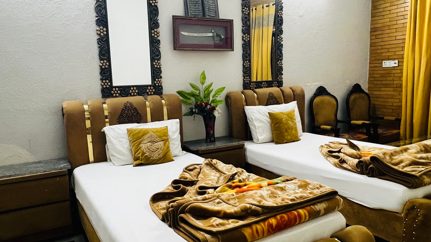 G3 – 4 Single Beds | Galaxy Lodge  Price: PKR 15000 / night Capacity: 4 Guests
