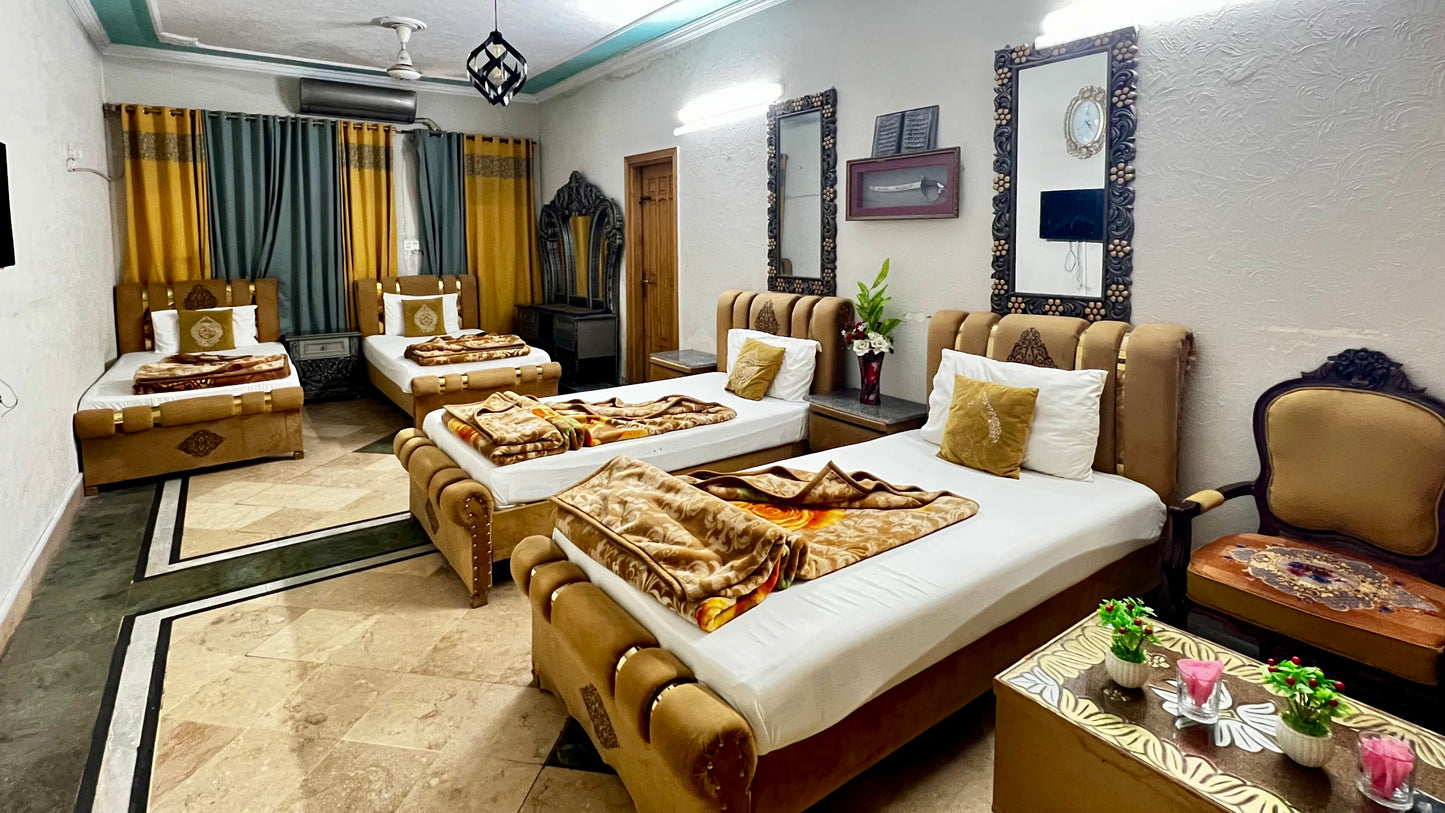 G3 – 4 Single Beds | Galaxy Lodge  Price: PKR 15000 / night Capacity: 4 Guests