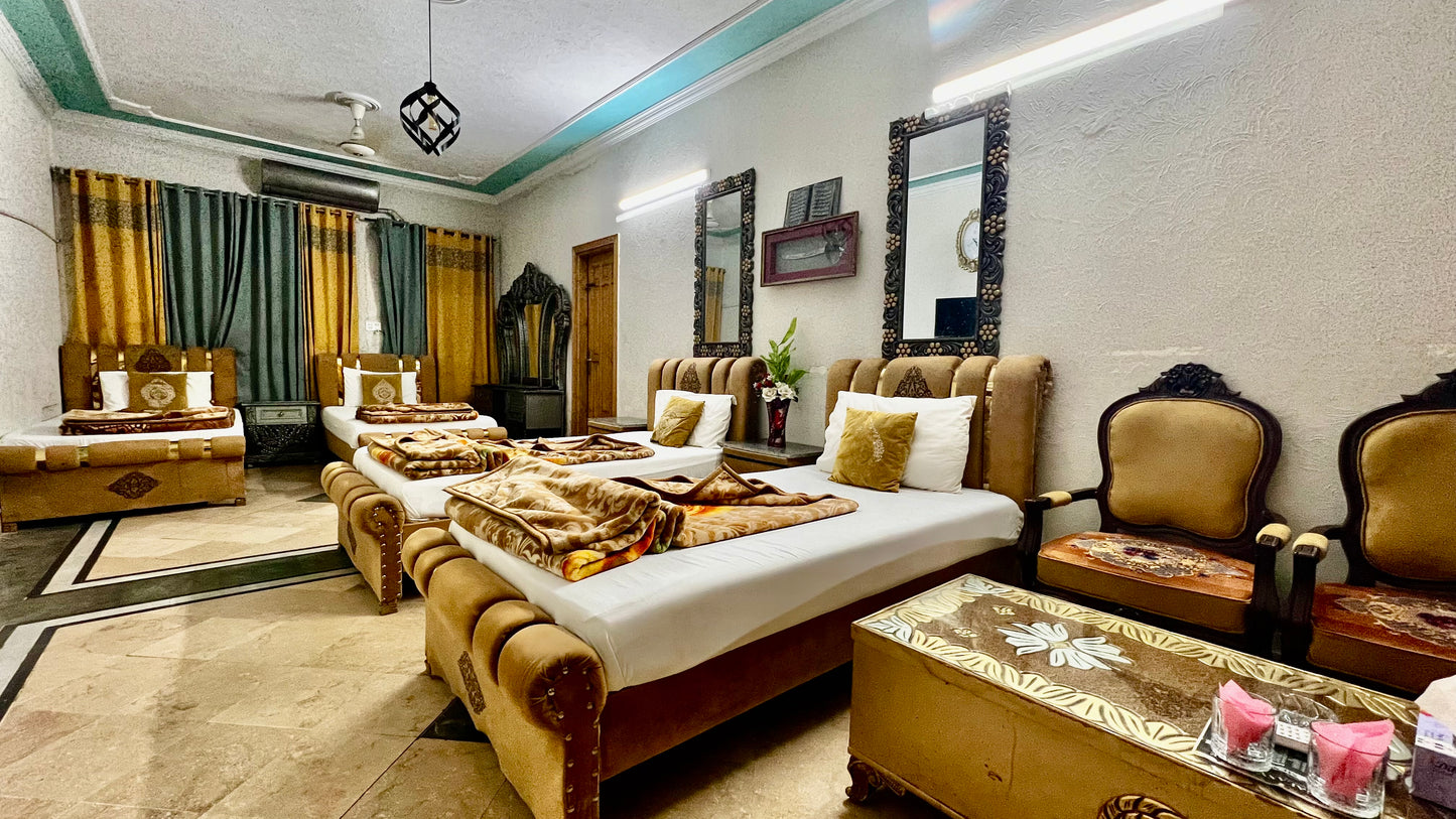 G3 – 4 Single Beds | Galaxy Lodge  Price: PKR 15000 / night Capacity: 4 Guests